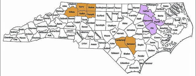 CWD Management Areas are in orange. CWD Surveillance Areas are in Purple. Non-surveillance Areas are in White.
                                 N.C. Wildlife Resources Commission map