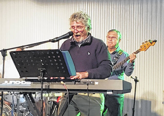 Howard Faircloth of Rivermist performs during the May Day Jamboree at Lu Mil Vineyard on Saturday, May 2.
                                 Sonny Jones / Bladen Journal