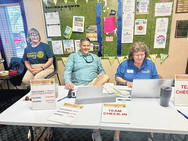 Elizabethtown Rotarians, from left, Tiina Munday, Mike Davis and Terri Dennison at the registration table.
Contributed photo