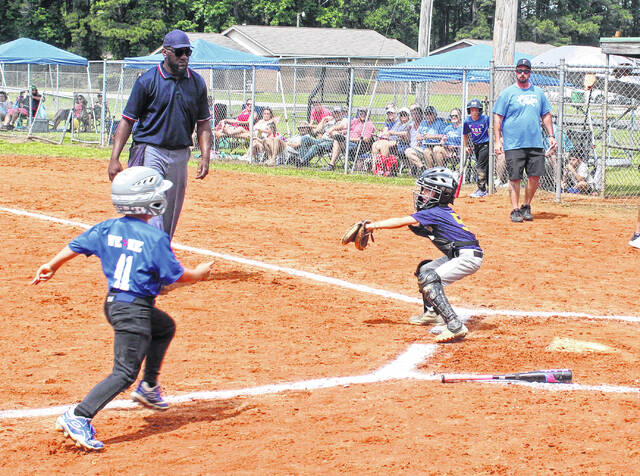 The Bladen County catcher gets set to tag out a Burgaw runner at home during Saturdays game.
                                 Sonny Jones / Bladen Journal