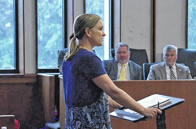 Hilary Klein, senior counsel for voting rights with the Southern Coalition for Social Justice, speaks in front of the Bladen County Board of Commissioners about the organizations concern about the proposal to shrink the governing body on June 1.
                                 Photo by Morgan Casey for Border Belt Independent
