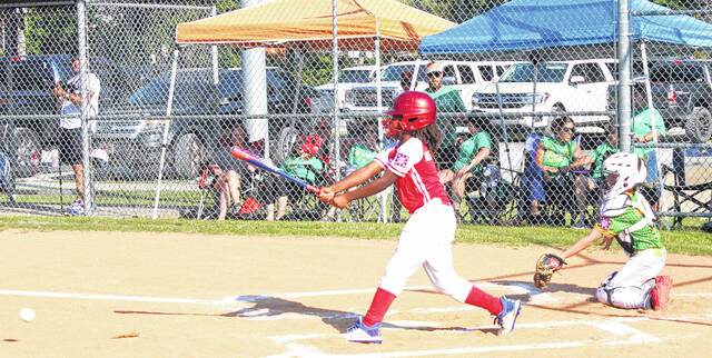 Bladen Countys Jo Jo Adams (4) makes contact for a hit against Columbus County.
                                 Sonny Jones / Bladen Journal