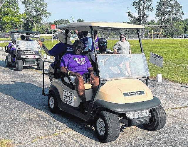 People take part in the Survivors Lap during the Relay For Life event at Elizabethtown Middle School on Saturday, June 6.
Lexie Tatum photo