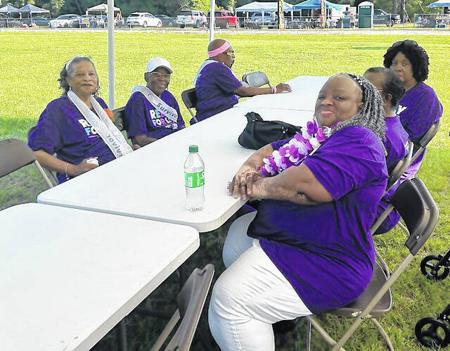 Cancer survivors prepare for dinner during the Relay For Life event Saturday, June 6.
Lexie Tatum photo
