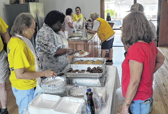 People go through the serving line during the Clarkton Lions Club pancake breakfast
Contributed photo